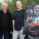 Trevor Macy and Mike Flanagan pose next to a "Midnight Mass" poster at a special screening at San Vicente Bungalows in California.
